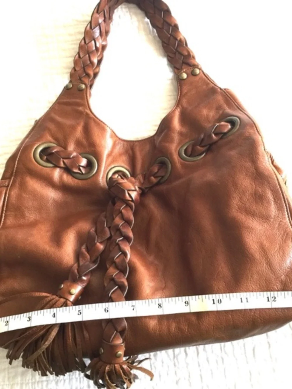 Kooba “Carla” light brown leather shoulder bag‎ w/braiding detail & side pockets